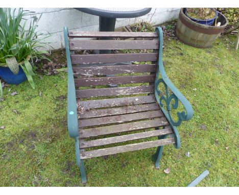 Pair of garden chairs and decorative wheelbarrow planter