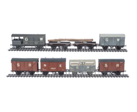 
	
		A collection of seven 10mm scale gauge 1 assorted goods rolling stock, to include a NE fruit wagon,  GWR cattle wagons, 