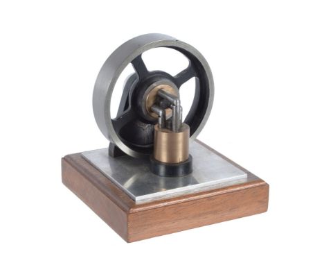 A well engineered model of a six cylinder 'Elbow' stationary engine, with only five moving parts. The model mounted on plate 