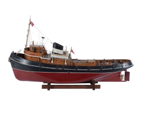 An award winning model of the live steam campaign tug 'Campaigner', the model with detailing to include a wheel house with ga