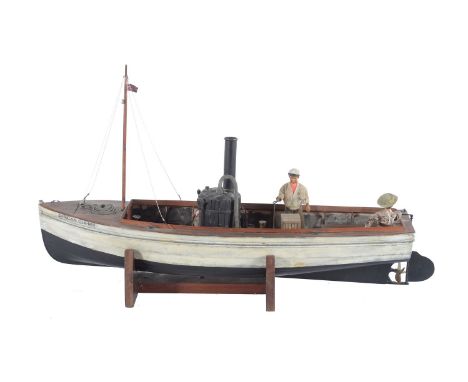 A model of the 'African Queen' steam boat, having fitted steam plant with vertical boiler linked to oscillating engine having