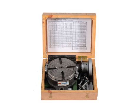 A Vertex rotary table, with index plates in original case.