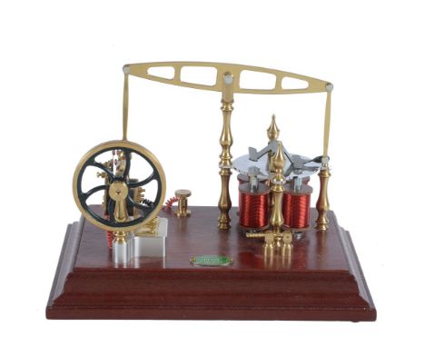 A model of an Old Model Company No 2  polished brass electronic driven beam engine, with spoked flywheel and set on polished 