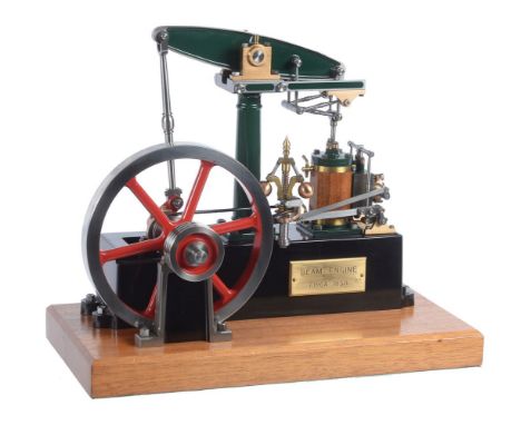 An exhibition standard model of a Stuart Turner standard beam engine, the turned column supporting beam with split gun-metal 