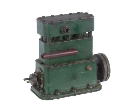 A well engineered model of a twin cylinder high speed boat engine, having enclosed crank, disc flywheel and pin location driv
