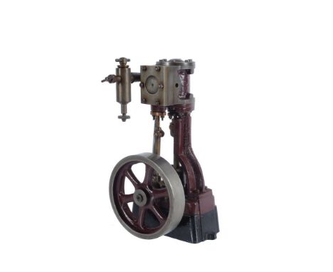 A well engineered model of a Stuart Turner vertical steam engine, being of open crank design with vertical guide, the single 
