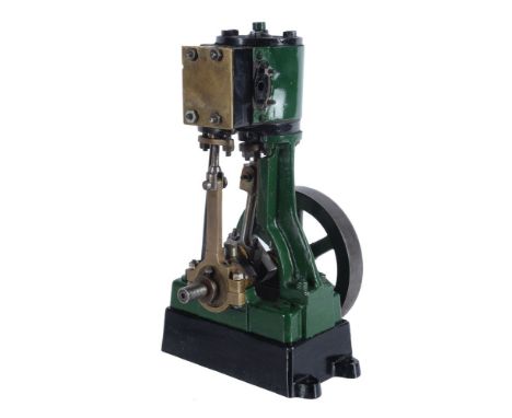 A well engineered model of a Stuart Turner vertical live steam engine, having single cylinder approximately 1 inch stroke by 