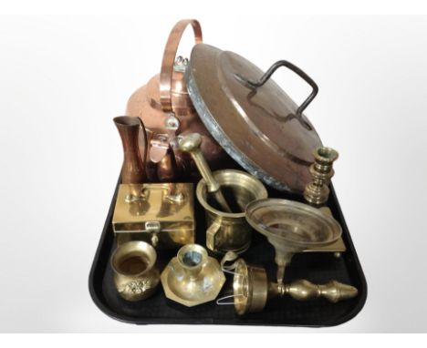 A large copper kettle together with a 19th-century copper pan lid, brass pestle and mortar, candlestick, trinket box, etc.