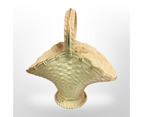 A Royal Worcester blush ivory basket, shape number 993, height 19cm.