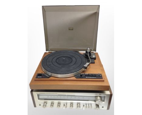 A Garrard DD75 direct drive turntable, together with a Pioneer stereo-receiver model SC-650, in teak case, with leads.