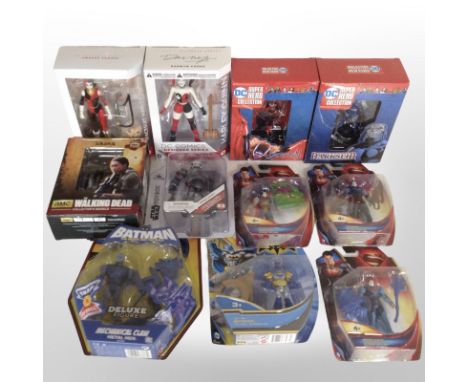 11 Mattel and other figurines to include Superman, Batman, The Walking Dead, etc., boxed.