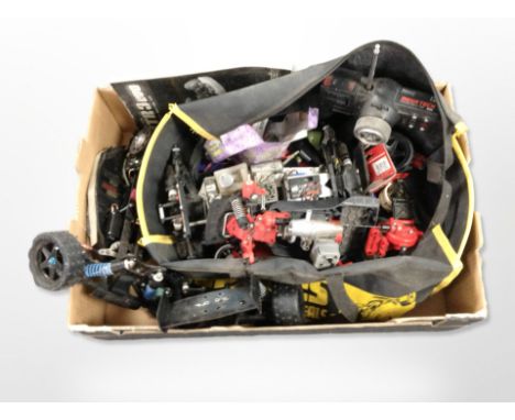 A quantity of remote-control car components including engine parts, hand set, etc. (1 box)
