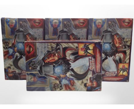 Four Mattel Superman figurines, boxed.