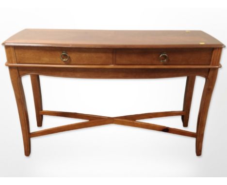 A reproduction yew wood console table, fitted two drawers, 117 cm x 40 cm x 74 cm 
