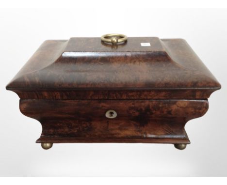 A reproduction mahogany sarcophagus tea caddy in the Regency style, with scumbled finish to exterior, width 24cm.