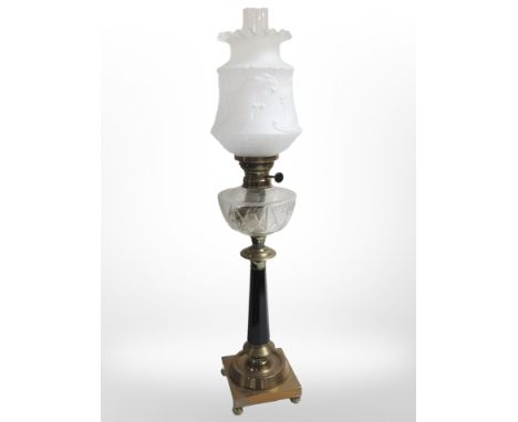 A brass and glass oil lamp with frosted glass shade, height 80 cm, and a pottery wash jug with basin 