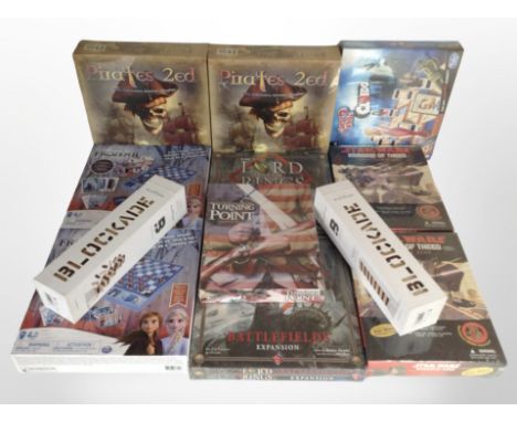 12 assorted board games including Disney, Star Wars,  The Lord of the Rings, etc., all sealed in cellophane.