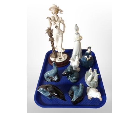 A group of Poole figures of sea lions, a dolphin and an otter, together with several Nao figures of geese, a Royal Doulton fi
