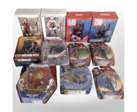 11 Mattel and other figurines to include Superman, Batman, The Walking Dead, etc., boxed.