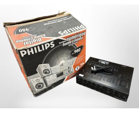 A TOA PA amplifier model A-1724, together with a Philips home cinema system, in box.