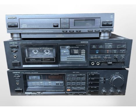 A Philips CD210 compact disk player, Onkyo TA-2027 stereo cassette tape deck, and a further Onkyo TX-27 quartz synthesised tu