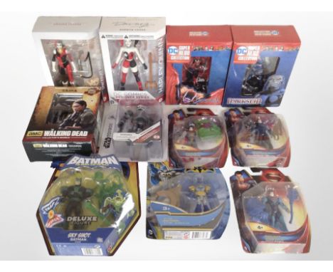 11 Mattel and other figurines to include Superman, Batman, The Walking Dead, etc., boxed.