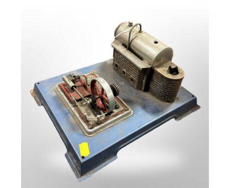 A live steam stationary piston engine and boiler on plinth, length 30cm.