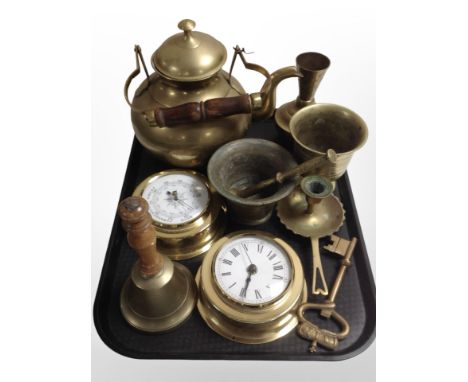 A group of brass items including mortar and pestle, Bell teapot, clock and barometer, key, etc.
