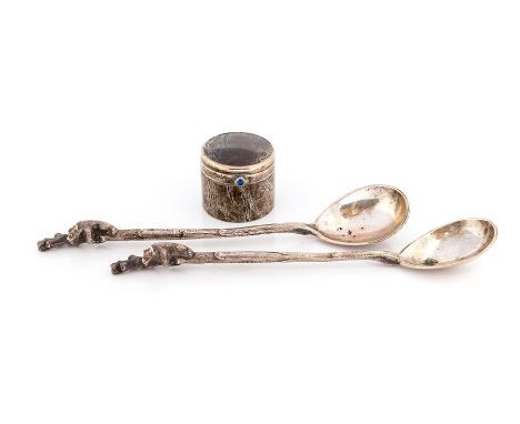 A pair of Russian 'tea holder' silver spoons, the stems cast naturalistically with bears climbing a tree stump, approx 16.5cm