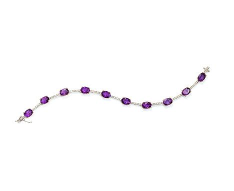 An  amethyst and diamond 9ct yellow and white gold line bracelet, with ten oval-cut claw-set amethyst approx 1ct each, with d