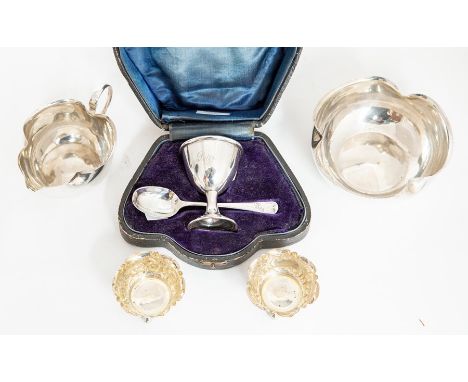 A collection of silver table ware including: Victorian milk jug and milk jug, plain trefoil shaped with beaded rim, by George