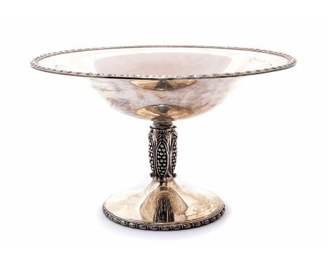 An Elizabeth II silver table centrepiece, flared bowl and spreading circular foot with egg-and-dart rim, the central stem cas