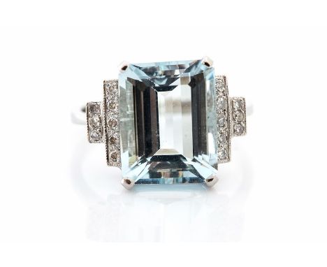 An aquamarine and diamond platinum ring, the step-cut aquamarine approx 6.0 carats, stepped diamond-set shoulders approx 0.20