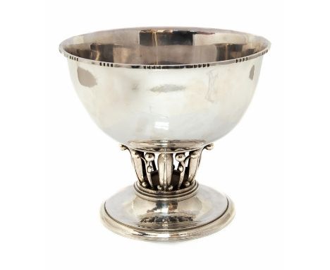 Georg Jensen- A Danish silver Louvre centrepiece bowl, hammer finish with crimped rim on an openwork pedestal of leaves and b