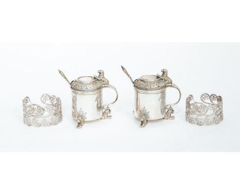 A pair of mid 20th Century 830 standard Norwegian silver Baroque style mustard pot and covers and matching spoons, the pots c