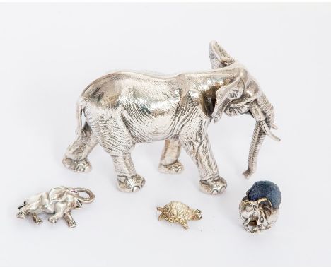 Elephant interest: A Victorian style miniature elephant shaped pin cushion, London, 1954, JG?; together with an model of an E