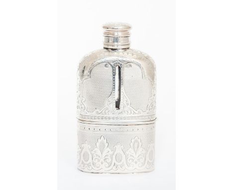 A Victorian silver mounted hip flask, the glass bottle silver mounted in two sections, the fixed top engraved with scales wit