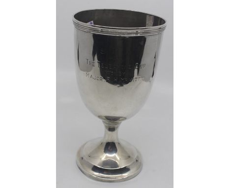 An Edwardian large goblet, reeded rim and lower section on plain raised stepped foot, the plain body engraved with presentati