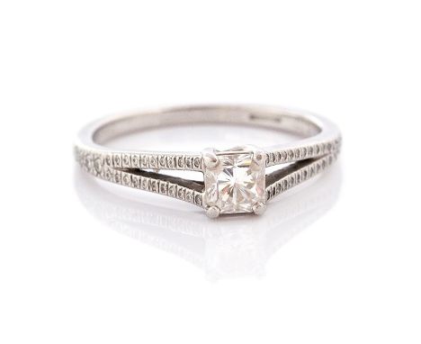 Tiffany & Co-  A  diamond and platinum 'Lucida' ring, by Tiffany & Co, the claw set square mixed cut diamond weighing approx.