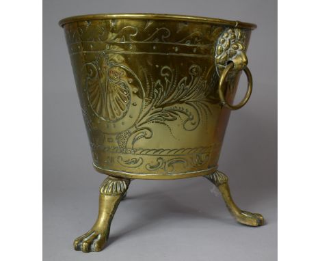 A Brass Cylindrical Planter on Three Claw Feet with Lion Mask Ring Carrying Handles, 26cm diameter 