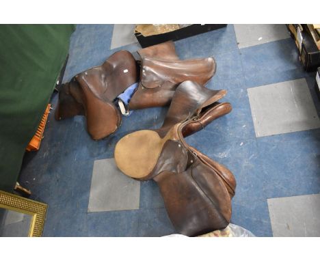 Three Vintage Leather Saddles 