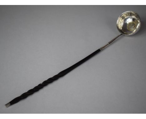 A George III Ladle with Coin Mount for 1787, Twisted Baleen Handle, 37cm long 