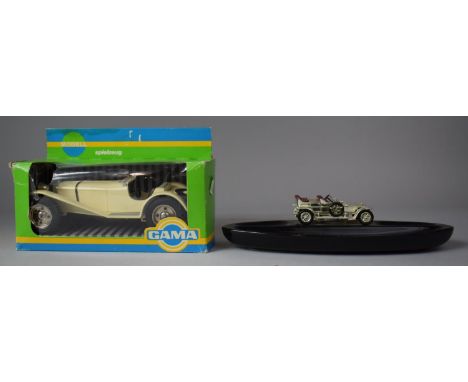 A Ceramic Desk Top Pen Rest with Vintage Car Mount and a Boxed Diecast Vintage Car 