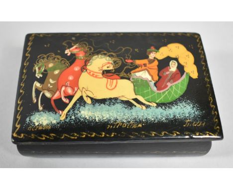 A Russian Lacquered Rectangular Snuff Box, the Hinged Lid Decorated in Coloured Enamels Depicting Troika, Signed, 9cm wide 