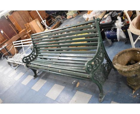 A Vintage Cast Iron and Wooden Scroll Arm Bench, 185cm wide 