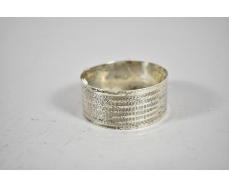 A Large Silver Vintage Bangle in the Form of a Belt, Stamped Sterling 6.5cm diameter 
