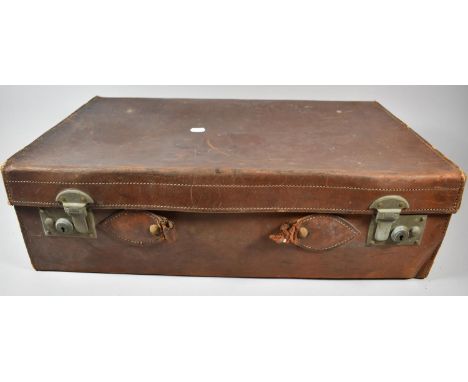 A Vintage Leather Suitcase, 61cm wide, Handle Requires attention 
