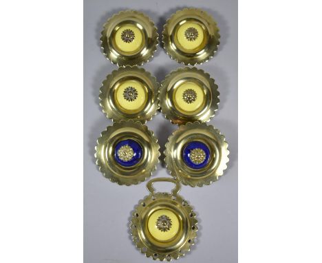 A Collection of Six Brass and Ceramic Bullseye Horsebrasses 