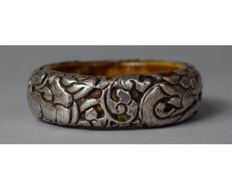 A Vintage Chineses Bangle Having White Metal Overlay Depicting Dragon, 8.5cm diameter