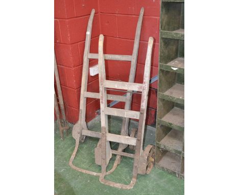 Two vintage sack barrows.